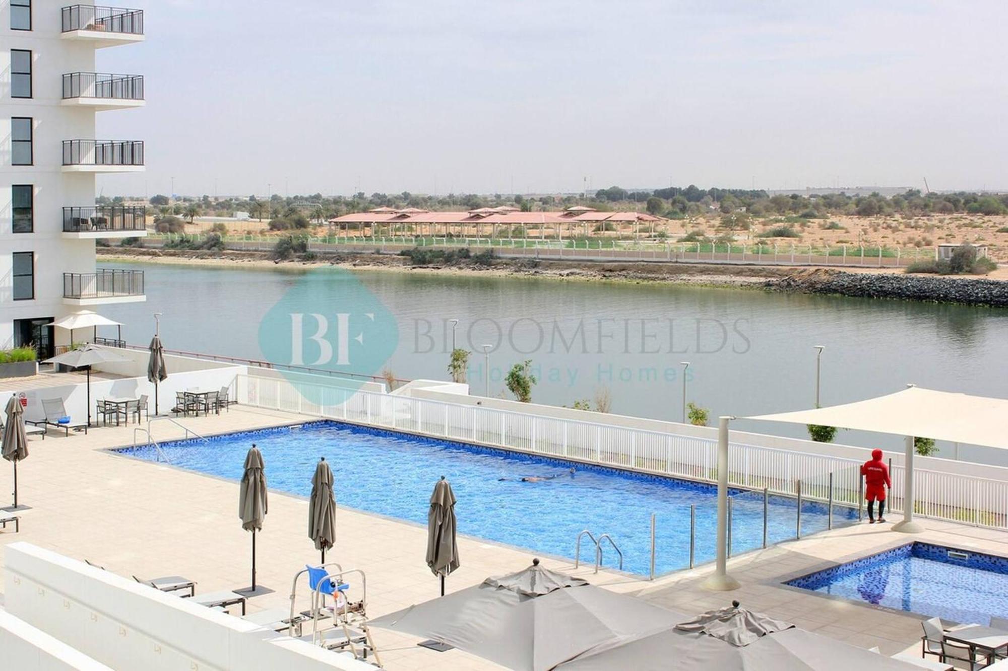 Apartment Bloomfields 1br Canal View In Waters Edge Yas *